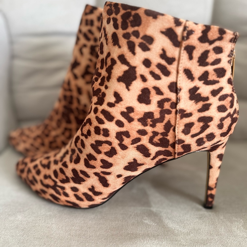Express leopard stiletto ankle booties. Size 9W.